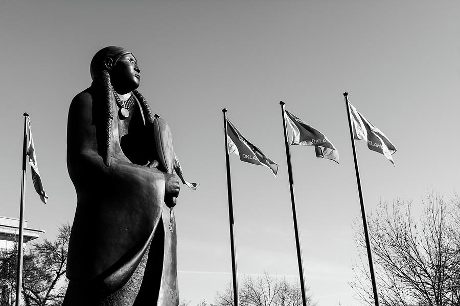 Statue and Flags Photograph by Hillis Creative