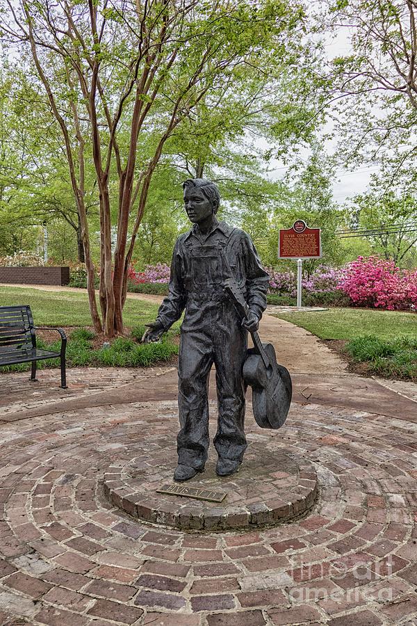 Statue Of Elvis Presley At 13 Outside His Birthplace In Tupelo Photograph