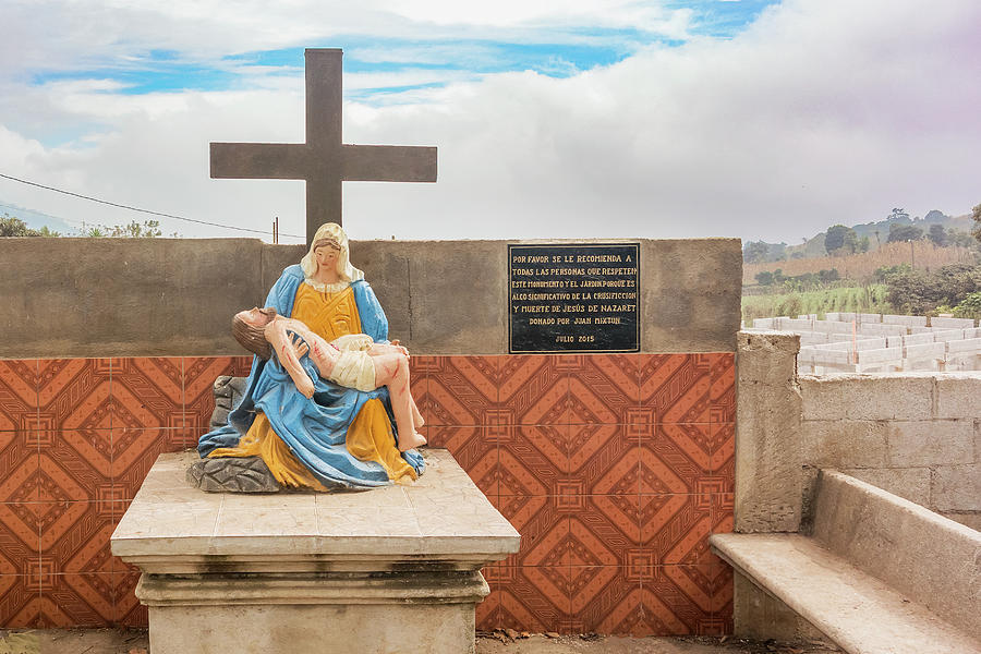 Statue of Jesus and Mary at the road in Guatemala. Photograph by Marek Poplawski