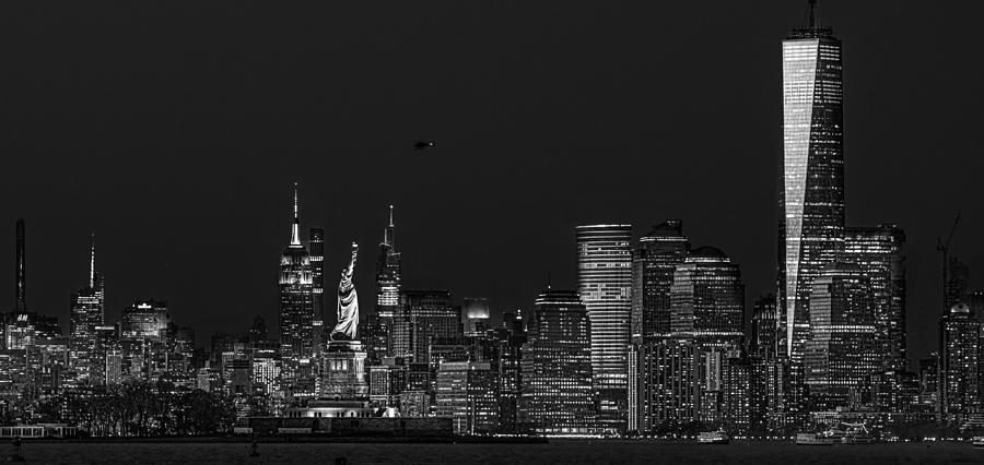 Night Photograph - Statue Of Liberty by Yanny Liu