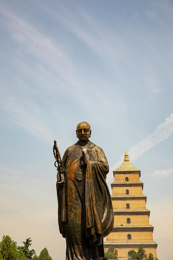 Statue of Xuanzang standing  in front of Big WIld Goose Pagoda,  Photograph by Karen Foley