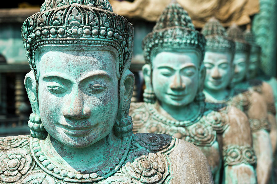 Statues, Wat Thmei, Angkor Wat, Cambodia Photograph by John Harper
