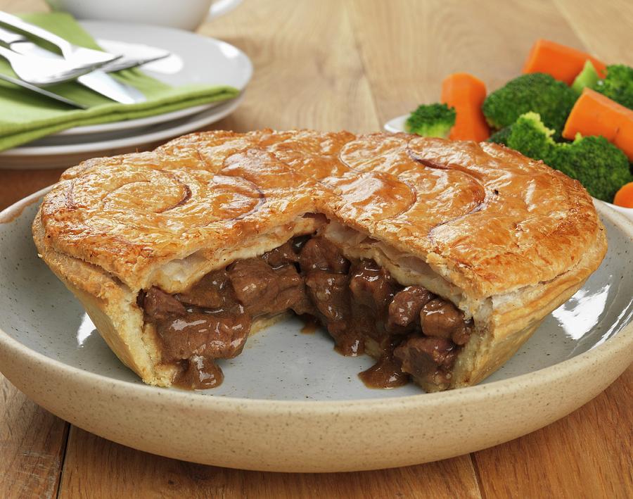 Steak And Onion Pie, Sliced Photograph by Robert Morris