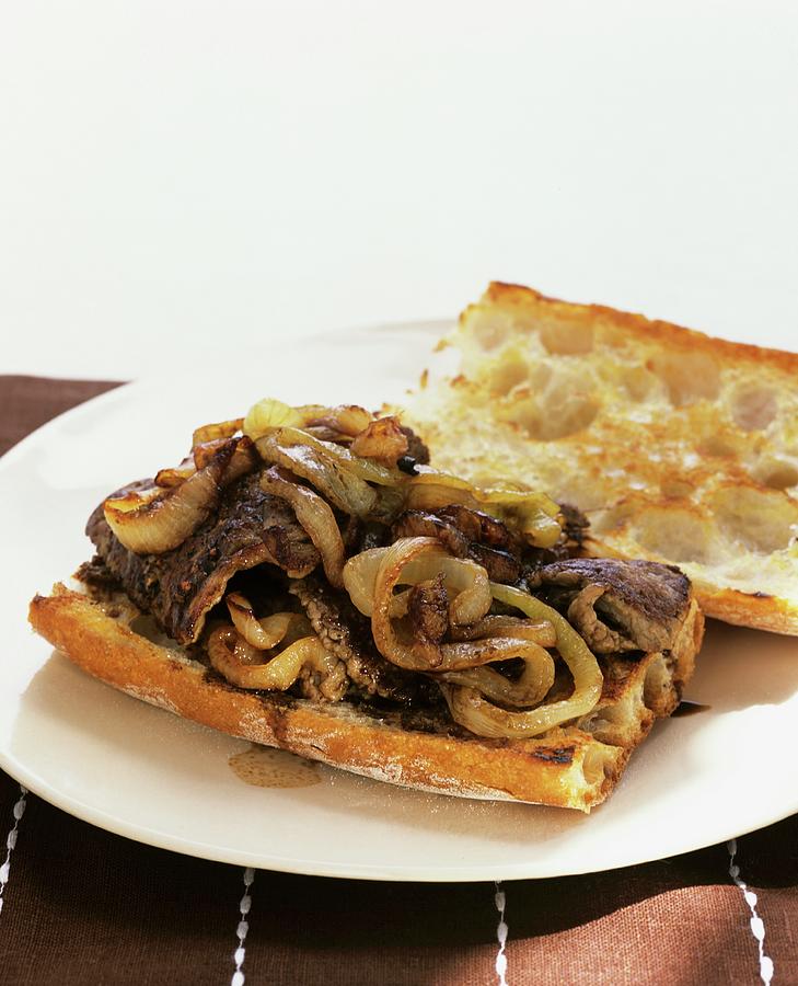 Steak And Onion Sandwich Photograph by Clive Streeter