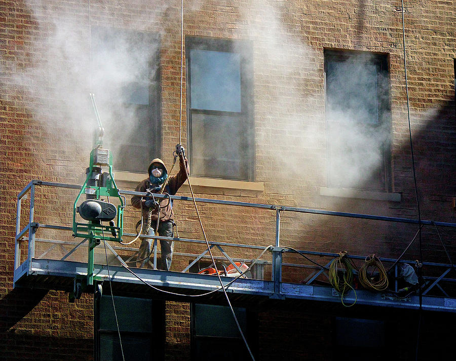 Steam Cleaning A Building Photograph