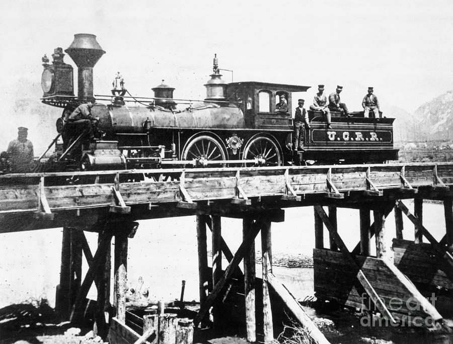 Transportation Photograph - Steam Locomotive Passing Over Trestle by Bettmann