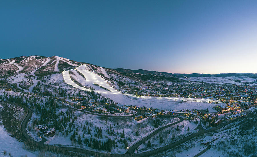 Steamboat Springs Ski Resort With Lights At Dusk Photograph by Cavan Images