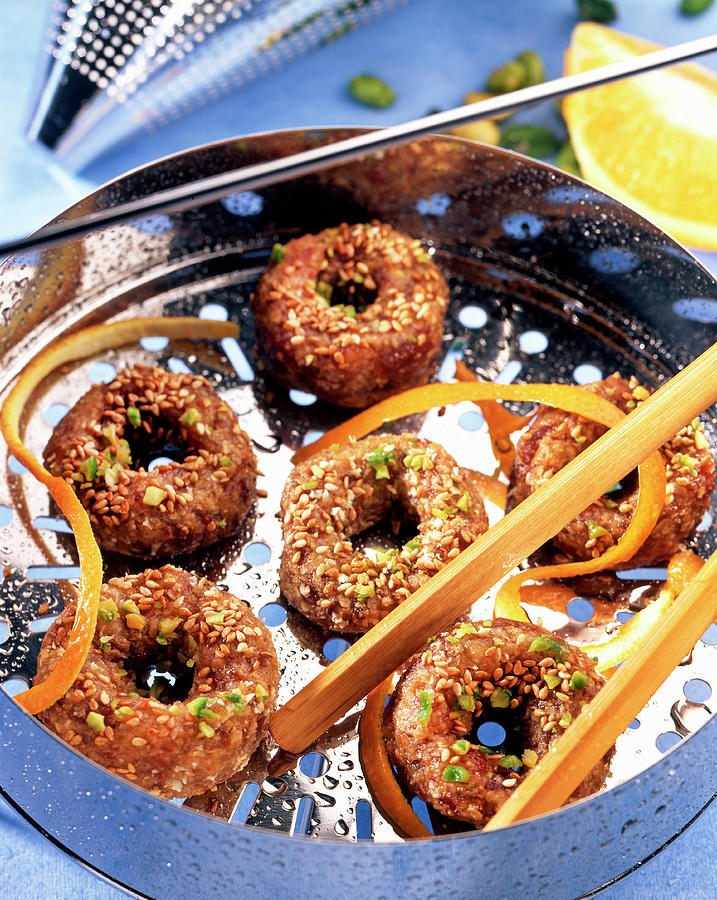 Steamed Date Rings With Pistachio Nuts And Sesame Seeds Photograph by Franco Pizzochero