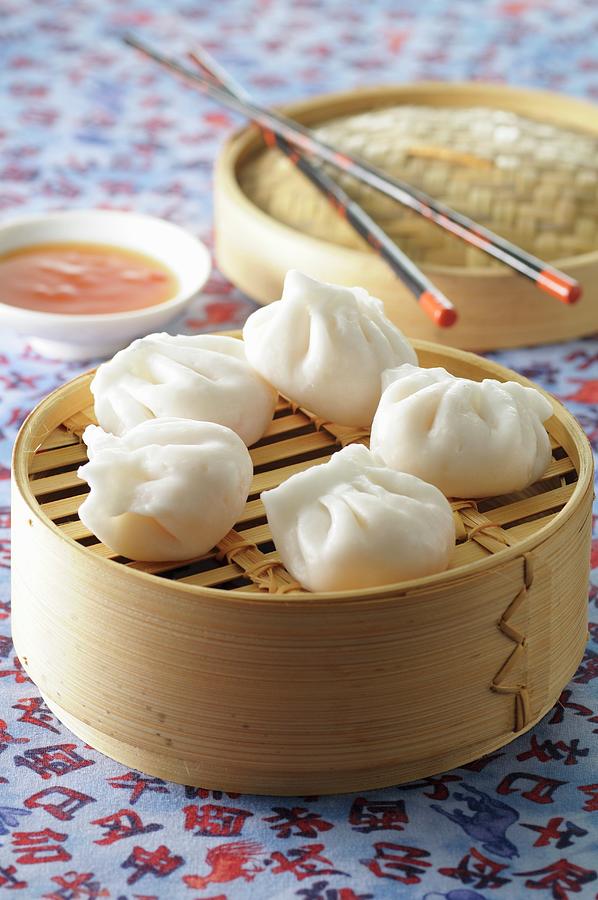 Steamed Dumplings With A Chilli Sauce Photograph by Jean-christophe Riou