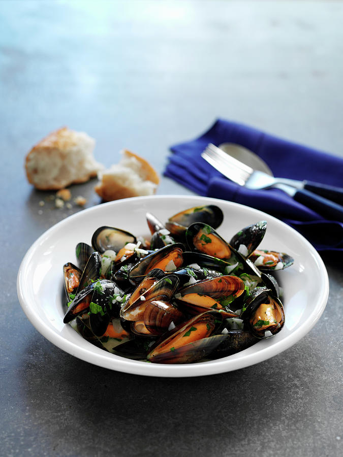 Steamed Mussels With A Chunk Of Baguette Photograph by Gareth Morgans