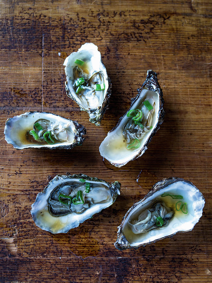 Steamed Oysters With Soy Sauce And Spring Onions Photograph by Tre Torri