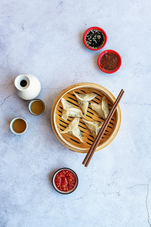Steamed Prawn Dumplings With Chilli Oil, Sambal Oelek And Soy Sauce Photograph by Hein Van Tonder