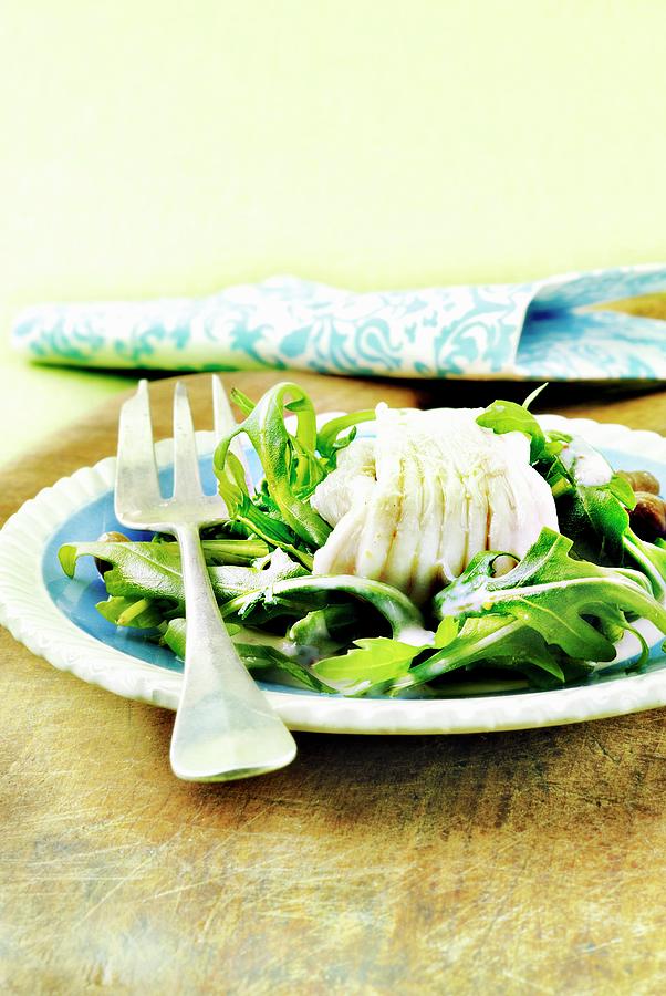 Steamed Skate With Capers And Rocket Lettuce With White Sauce Photograph by Perrin