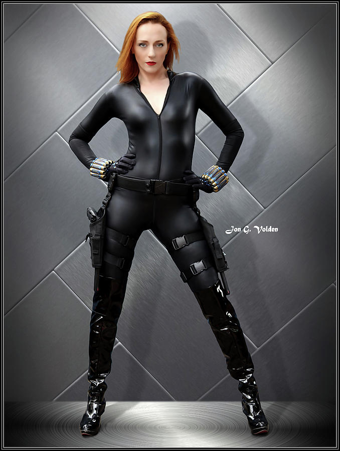 Steely Black Widow Photograph by Jon Volden