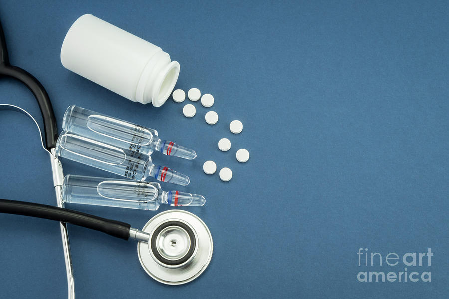 Stethoscope Next To Spilt Pills And Vials Photograph by Digicomphoto/science Photo Library