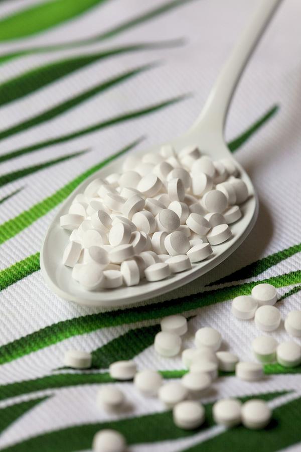 Stevia Tablets On A Spoon Photograph by Mche, Hilde