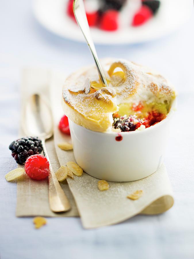 Stewed Summer Fruit Meringue Puddings With Thinly Sliced Almonds Photograph by Roulier-turiot