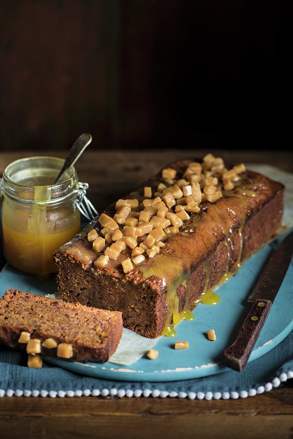 Sticky Toffee Pudding With Caramel Sauce And Toffee Chunks england Photograph by Magdalena Hendey