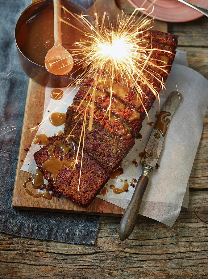 Sticky Toffee Pudding With Sparkler Photograph by Dan Jones