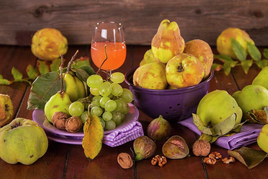 Still Life With Autumn Fruits, Quince Juice And Walnuts Photograph by Monika Halmos
