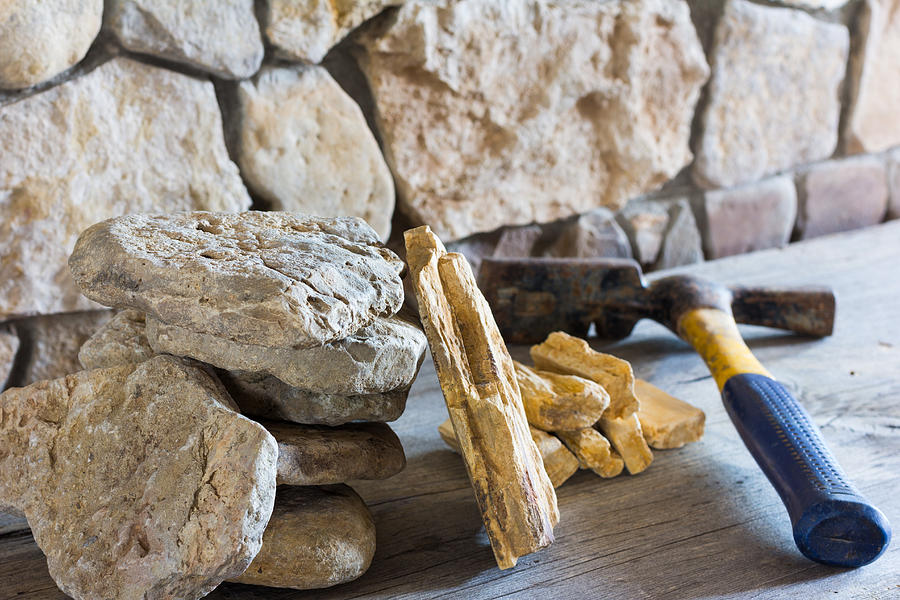 Architecture Photograph - Still Life With Construction Hammer And Flagstone Stone For Wall Cladding by Andre Solovie