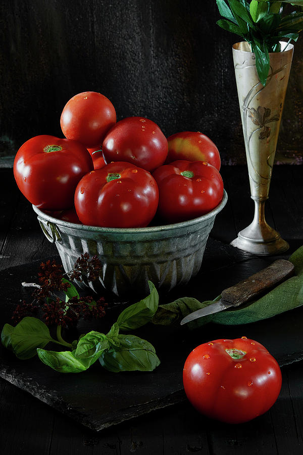 Still Life With Fresh Beefsteak Tomatoes And Basil On Black Background Photograph by Corina Daniela Obertas