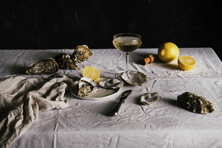 Still Life With Oyters And Lemon Photograph by Justina Ramanauskiene