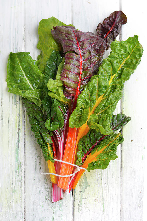 Still Life With Swiss Chard On A White Background Photograph by Keroudan