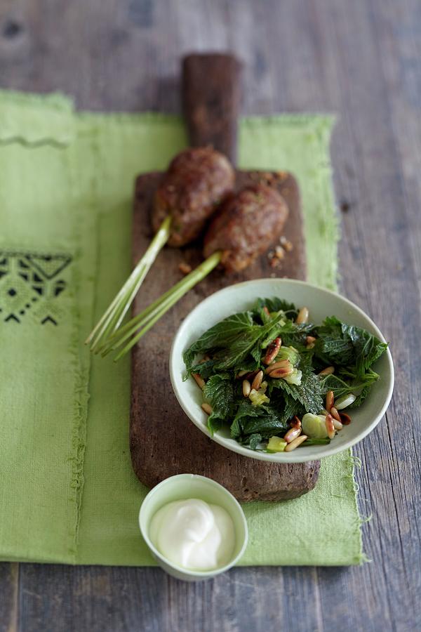 Stinging Nettle Spinach With Pine Nuts Served With Kofta Meatballs Photograph by Anke Schtz