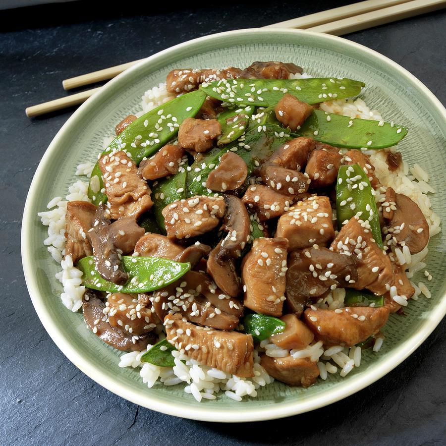 Stir-fried Chicken With Mangetout On A Bed Of Rice asia Photograph by Paul Poplis
