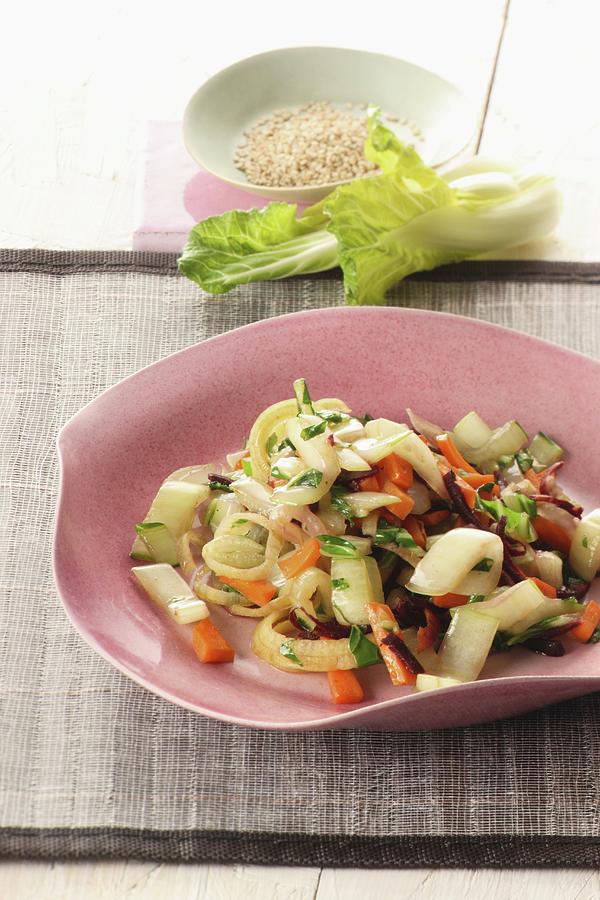 Stir-fried Pak Choi With Carrots And Sesame Seeds Photograph by Uwe Bender