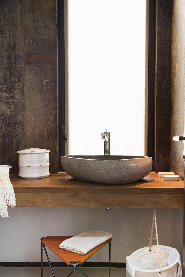Stone, Countertop Sink In Rustic Bathroom With Wood-clad Walls Photograph by Celeste Najt