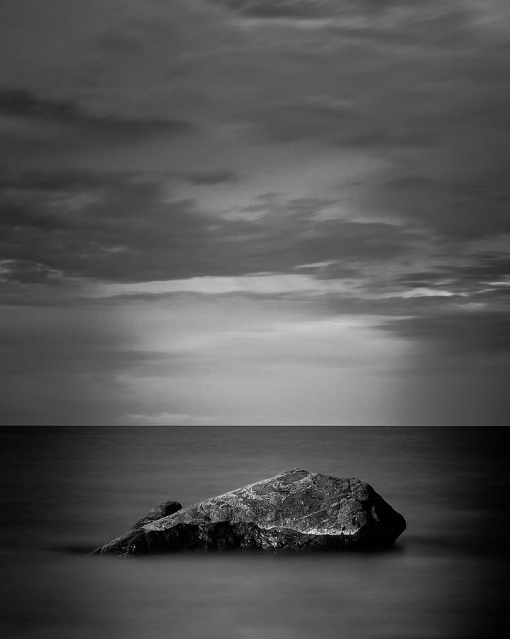 Stone in the ocean Photograph by Timo Reunanen - Pixels