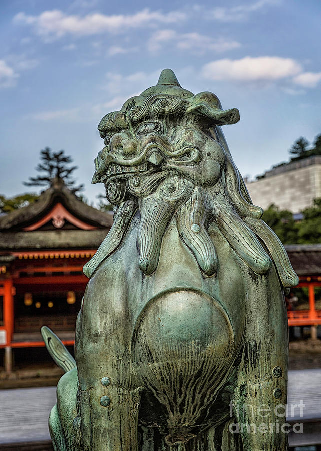 Stone lion statue at Itsukushima Shinto Shrine Photograph by Karen Jorstad