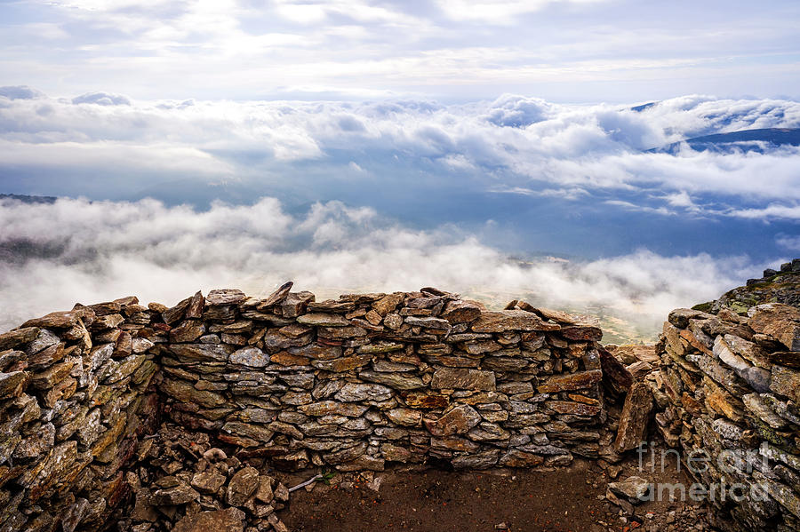 Stone shelter on top of the mountainous peak of Penarala, in the Sierra de Guadarrama, Spain. Photograph by Joaquin Corbalan