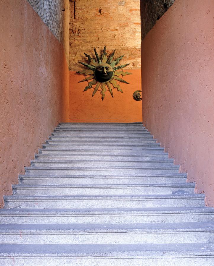 Stone Stairs Rise Towards A Sun Sculpture In Italy Photograph by Evan Sklar