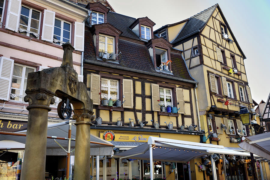 Stone well and  half-timbered houses in Colmar, Alsace, France Photograph by RicardMN Photography