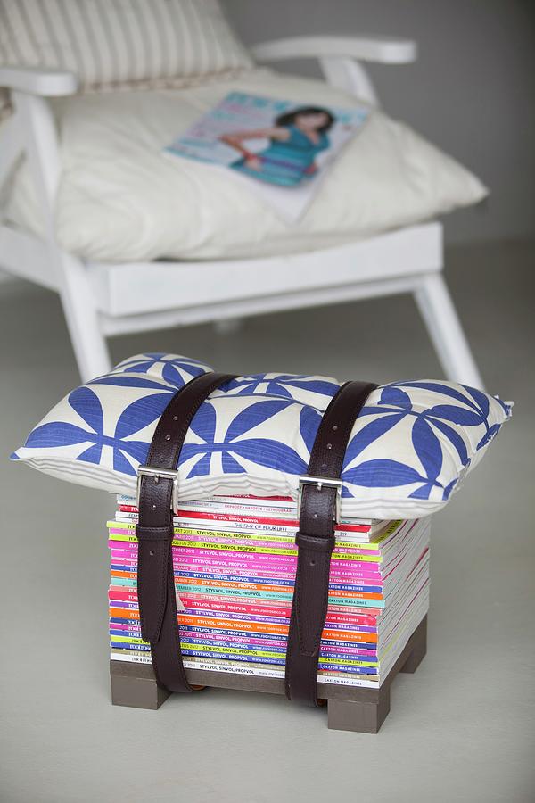 Stool Made From Stacked Magazines And Cushion Strapped Together With Belts Photograph by Great Stock!