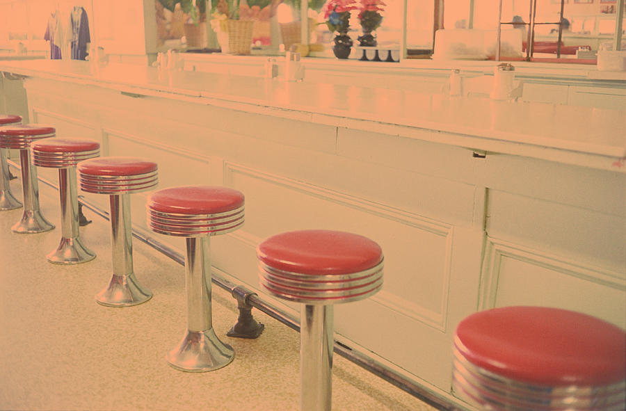 Stools At Bar Counter Photograph by Carol Whaley Addassi