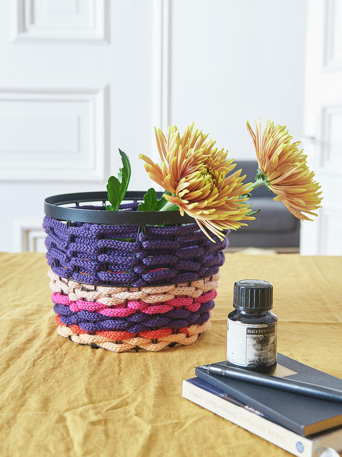 Storage Basket Made From Knitted Tubes Made Using Knitting Dolly Photograph by Hsfoto