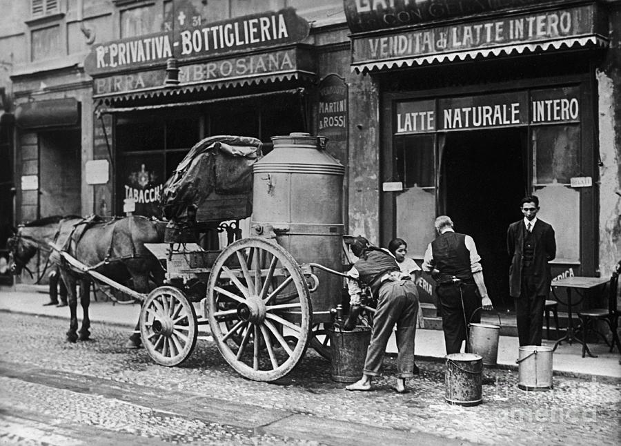Store Workers Collecting Milk From Wagon Photograph by Bettmann Store Workers Collecting Milk From Wagon Photograph by Bettmann