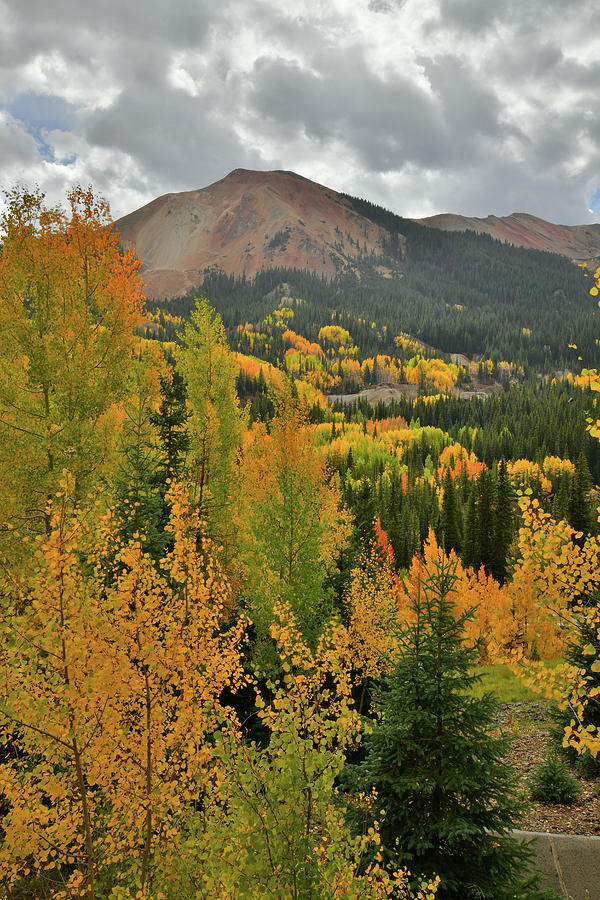 Storm above Fall Colors and Red Mountain Photograph by Ray Mathis