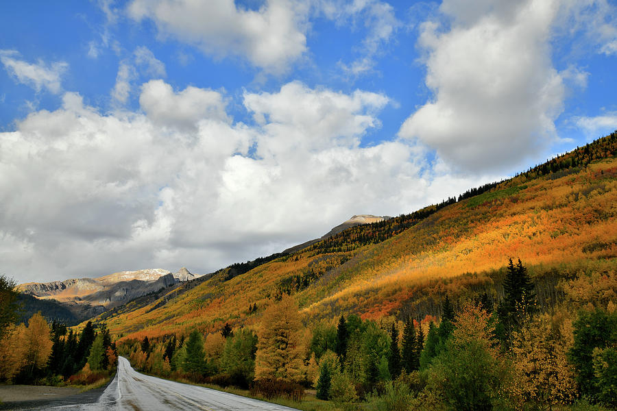 Storm Brewing over Fall Colored Million Dollar Highway Photograph by Ray Mathis