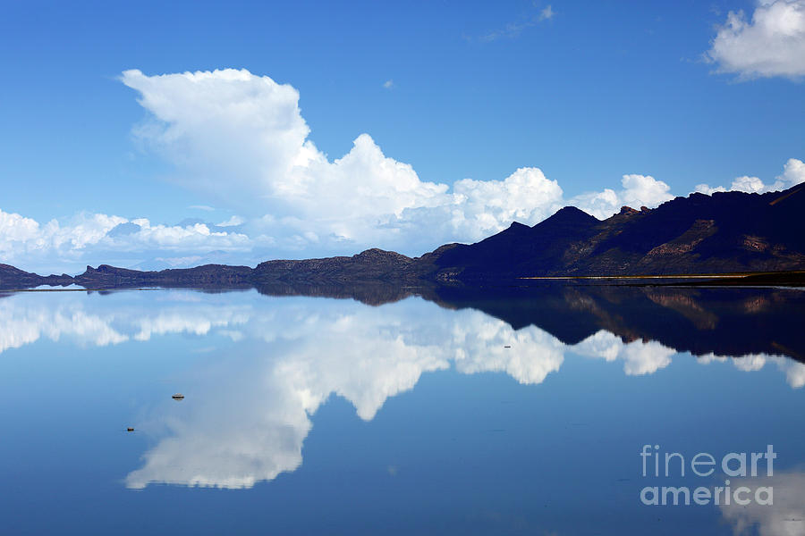 Storm Cloud Rising Over Salar de Uyuni Bolivia Photograph by James Brunker