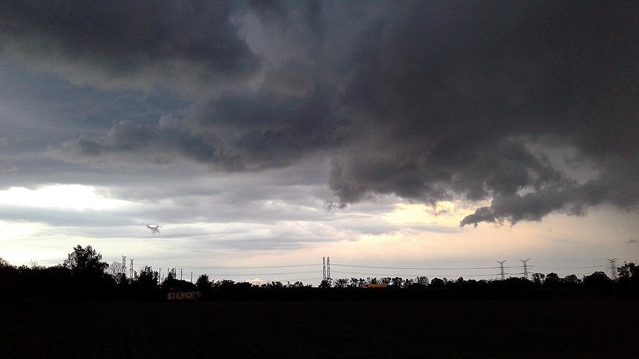 Sunset Photograph - Storm Cloud Stalker by Susan Janus