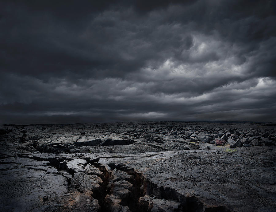 Storm Clouds Over Dry Rocky Landscape Photograph by Chris Clor
