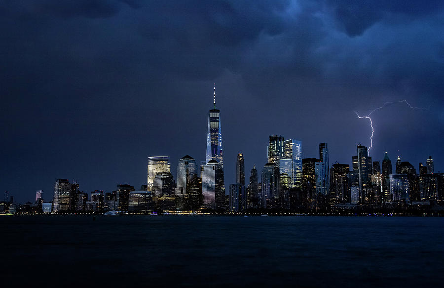 Storm over Manhattan Photograph by Kevin Plant