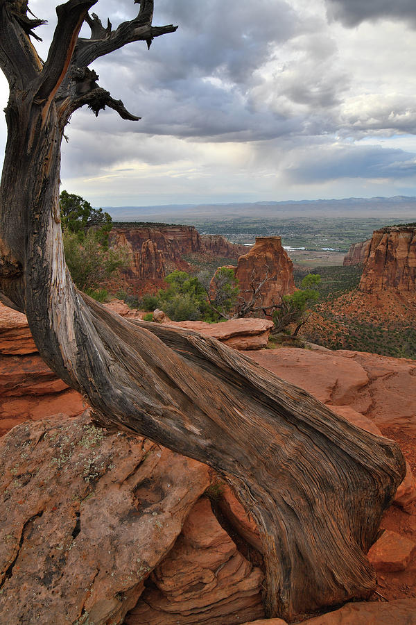 Storm over Monument Canyon in Colorado National Monument Photograph by Ray Mathis