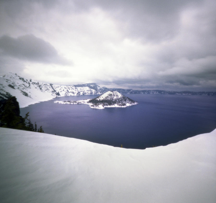 Stormy Skies Over Snowy Crater Lake Photograph by Danielle D. Hughson