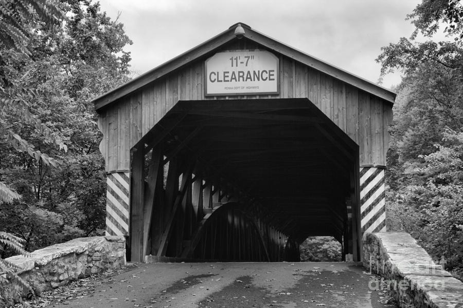 Stormy Skies Over The Academia Covered Bridge Black And White Photograph by Adam Jewell